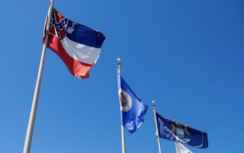 On Thursday, SEC commissioner Greg Sankey said in a statement that until the Confederate emblem is removed from Mississippi's state flag (left), the conference will consider precluding SEC championship events from being conducted in the Magnolia State. (MICKEY WELSH/Advertiser/TNS)