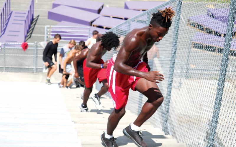 Columbia receiver Jaden Williams runs up the stadium steps during a summer workout in 2018. (FILE)