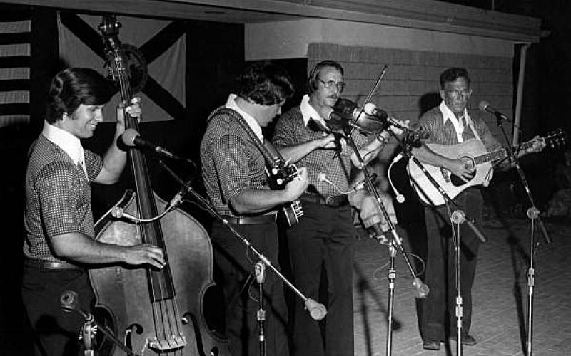 Donald Johns, far left, plays the upright bass at the Florida Folk Festival in 1979. (COURTESY)
