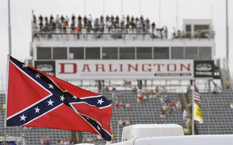 AConfederate flag flies in the infield before a NASCAR Xfinity auto race at Darlington Raceway on Sept. 5, 2015, in Darlington, S.C. (TERRY RENNA/AP File photo)