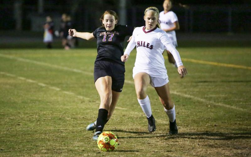 Columbia midfielder Adriana Watson chases down possession of the ball against Chiles during a match in 2018. (BRENT KUYKENDALL/Lake City Reporter)