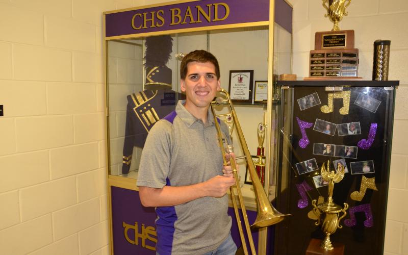 CHS band director Jay Miller is seen with his trumpet on campus. Miller was selected over countless other music educators as a quarterfinalist in the Grammy Music Educator Award for 2021. It’s a major honor that could net up to $10,000 for the school’s music program should he win. Miller credited his students with the fact that he’s made it this far. (CARL MCKINNEY/Lake City Reporter)