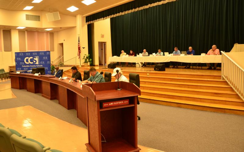 County charter board members hold the first of three hearings Wednesday. A proposal dealing with a controversial spending practice moved forward to another hearing, as did three other proposals. (CARL MCKINNEY/Lake City Reporter)