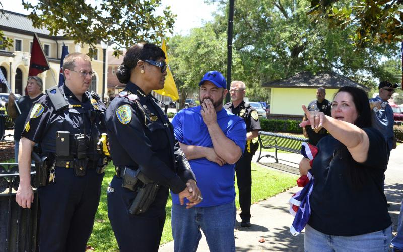 The rally came as part of the aftermath of the death of George Floyd. Mary Barlow of the local branch of League of the South (right) is seen with LCPD chief Argatha Gilmore, who explained that Barlow’s First Amendment rights did not include did not include heckling speakers at the event. (CARL MCKINNEY/Lake City Reporter)