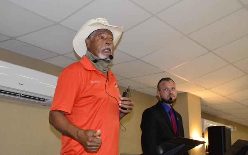 Long-time County Commission District 1 incumbent Ron Williams squares off with challenger Kyle Green during a Q&A session at a Republican-sponsored event Saturday night. Local GOP Chairman Hunter Peeler acted as moderator. (CARL MCKINNEY/Lake City Reporter)