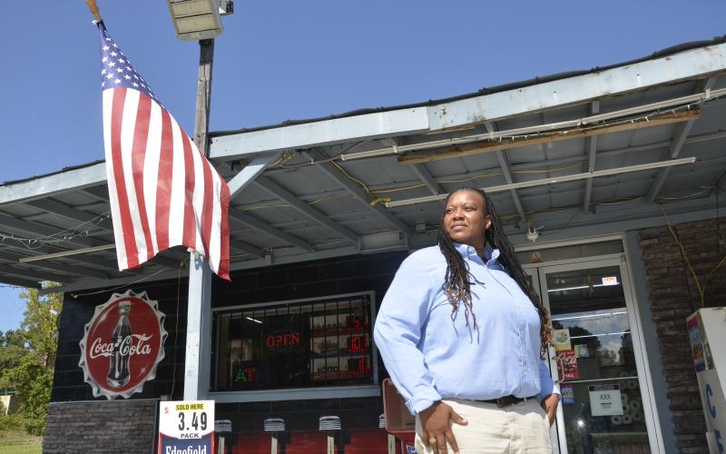 Tiffany Jordan strikes a pose outside a small, rural convenience store in Columbia County. Both Jordan and the store are set to be featured in an upcoming film, which begins shooting in August. (CARL MCKINNEY/Lake City Reporter)