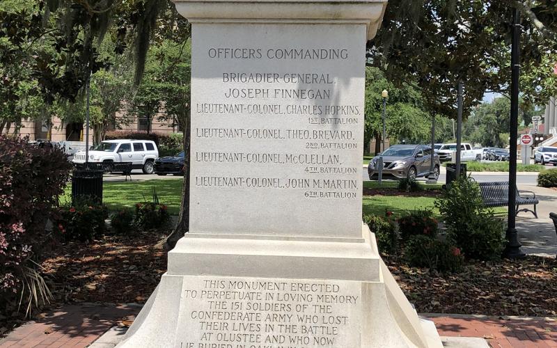 A Confederate monument sits in Olustee Park in downtown Lake City. The park is owned by the City of Live Oak, property appraiser records show. (FILE photo)