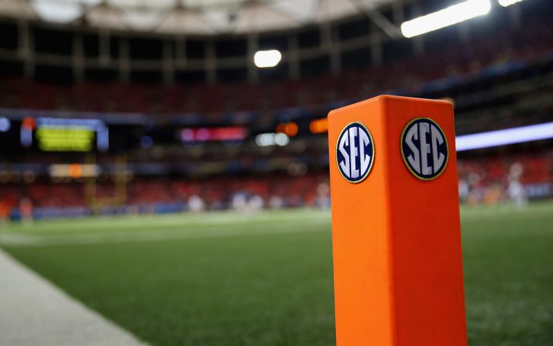 An SEC logo is seen on an end zone pylon before the Missouri Tigers take on the Auburn Tigers during the SEC Championship Game on Dec. 7, 2013 at the Georgia Dome in Atlanta, Georgia. The conference announced Tuesday that it's postponing the start of its volleyball, soccer and cross country seasons through at least Aug. 31. (MIKE EHRMANN/Getty Images/TNS)