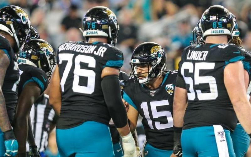 Jacksonville Jaguars quarterback Gardner Minshew II (15) calls a play in the huddle during the second half of an NFL football game against the Indianapolis Colts on Dec. 29, 2019 in Jacksonville. (TRIBUNE NEWS SERVICE)