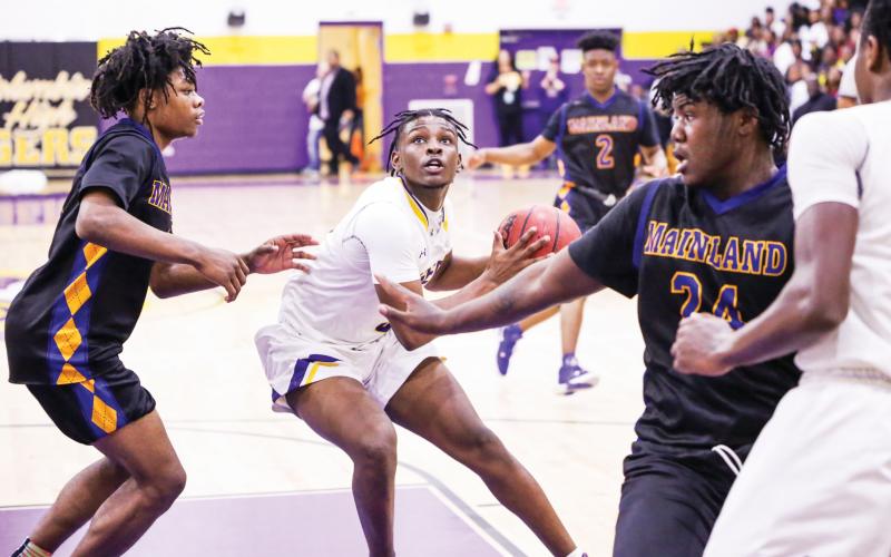 Columbia point guard Darrien Jones looks to shoot against Daytona Beach Mainland during this past season ‘s regional final. Jones helped lead the Tigers to their first Final Four since 1968. (FILE)