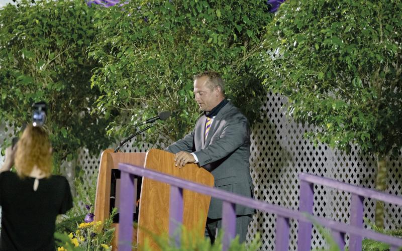 Columbia principal Trey Hosford addresses the Class of 2020 during Saturday night’s commencement. (RAY CARPENTER/Lake City Reporter)