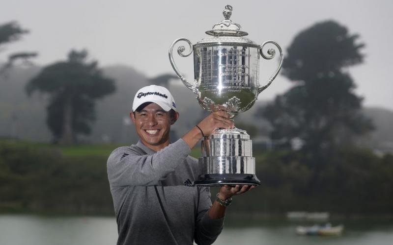 Collin Morikawa holds the Wanamaker Trophy after winning the PGA Championship golf tournament at TPC Harding Park on Sunday, in San Francisco. (JEFF CHIU/Associated Press)