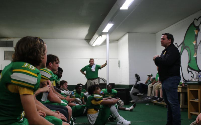 Gov. Ron DeSantis provides a prep talk Friday evening to the Suwannee High football team before its season opener against Santa Fe at Langford Stadium in Live Oak. SHS coach Kyler Hall took part in a roundtable discussion with DeSantis and others in early August about the importance of youth sports. (TONY BRITT/Lake City Reporter)