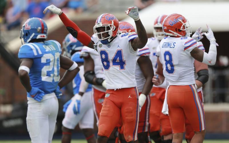 Florida receiver Kyle Pitts celebrates his fourth touchdown of the day on Saturday, in Oxford, Miss. (THOMAS WELLS/The Northeast Mississippi Daily Journal via AP)
