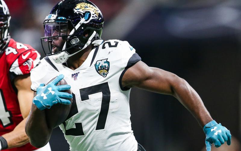 Former Jacksonville Jaguars running Leonard Fournette (27) rushes during the first half of a game against the Atlanta Falcons at Mercedes-Benz Stadium on Dec. 22, 2019, in Atlanta, GA. The Jaguars abruptly released Fournette on Monday. (CARMEN MANDATO/Getty Images/TNS)