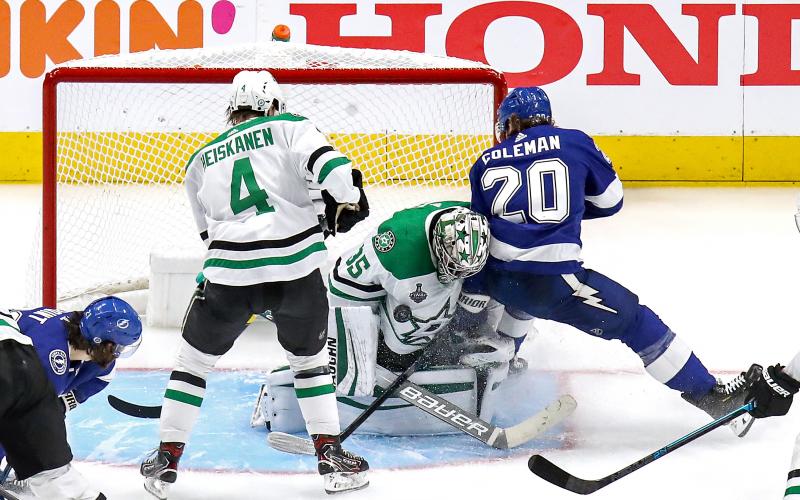 Dallas Stars goaltender Anton Khudobin (35) makes a save against the Tampa Bay Lightning's Blake Coleman (20) during the third period in Game 1 of the Stanley Cup Final at Rogers Place on Saturday, in Edmonton, Canada. The Stars won, 4-1. (BRUCE BENNETT/Getty Images/TNS)
