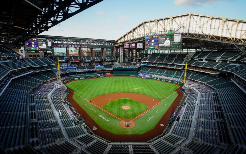 The Texas Rangers face the Oakland Athletics with the roof open during the first inning of game two of a double header at Globe Life Field on Saturday, in Arlington Tex. (SMILEY N. POOL/The Dallas Morning News/TNS)
