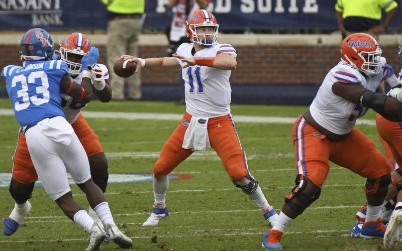 Florida quarterback Kyle Trask (11) releases a pass against Mississippi on Saturday, in Oxford, Miss. (THOMAS GRANING/Associated Press)