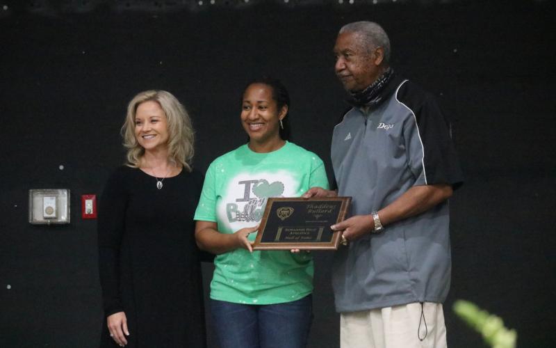 Charles Blalock, the former superintendent of Suwannee Schools, accepted the honor on behalf of former football player Thaddeus Bullard, who was in Charlotte with WWE. ((JAMIE WACHTER/Lake City Reporter)
