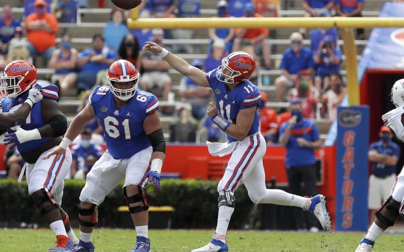 Florida quarterback Kyle Trask (11) throws a pass against South Carolina on Saturday, in Gainesville. (BRAD MCCLENNY/The Gainesville Sun via AP, Pool)