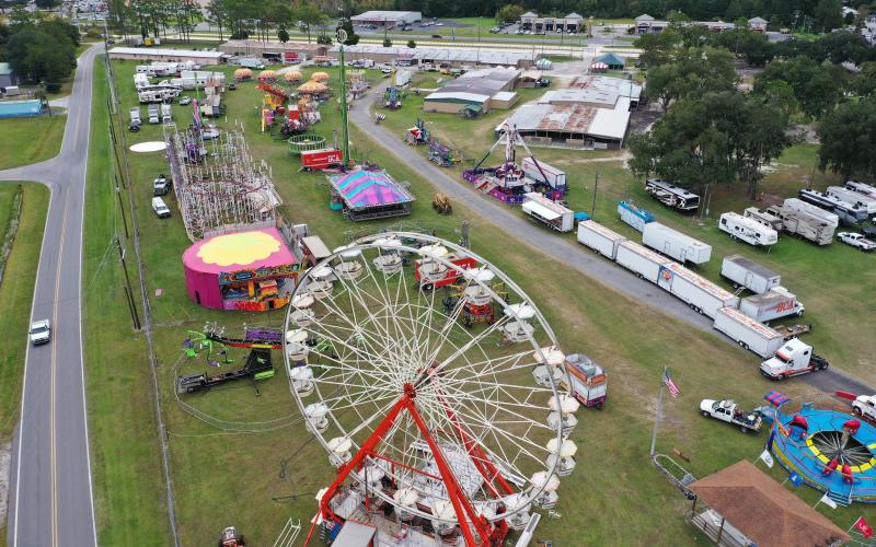 Rides on the midway at the Florida Gateway Fairgrounds were set up and assembled Tuesday prior to this weekend’s start of the 66th annual Florida Gateway Fair. (RAY CARPENTER PHOTOGRAPHY)