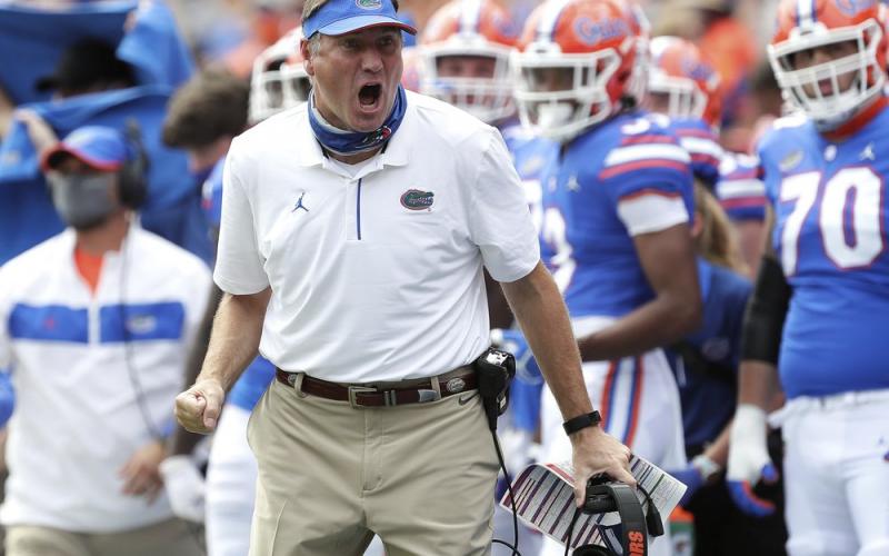 Florida head coach Dan Mullen yells to a referee about a call during a game against South Carolina on Oct. 3 in Gainesville. (AP POOL FILE PHOTO)