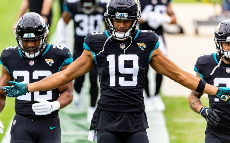 Jacksonville Jaguars wide receiver Collin Johnson (19) walks with running back Devine Ozigbo (22) before the Jaguars game against the Cleveland Browns at TIAA Bank Field on Sunday in Jacksonville. (MATT PENDLETON/TNS)