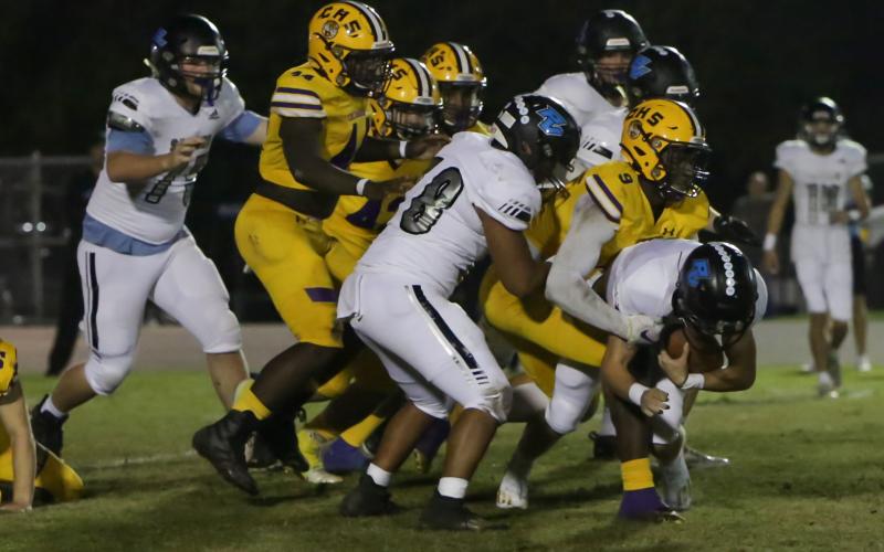 Columbia defensive lineman D.J. Bennett (9) makes a tackle against Ponte Vedra during Friday’s Region 1-6A playoff game. (BRENT KUYKENDALL/Lake City Reporter)