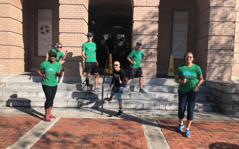 Gunster attorney Mike Freed, center, ran from the Columbia County Courthouse to the Baker County Courthouse Nov. 20 along with members of the Jacksonville Area Legal Aid board of directors as part of a six-marathon series that raises money for JALA. (COURTESY)