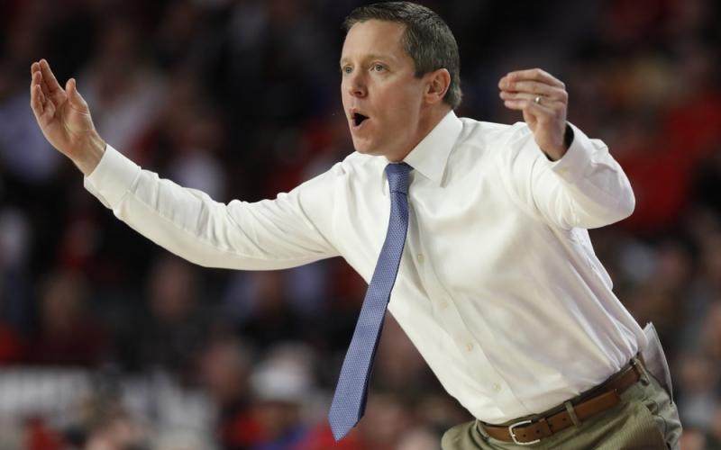 Florida coach Mike White gestures during a game against Georgia on March 4 in Athens, Ga. Unlike a year ago, Florida begins the season unranked and won’t have nearly as much hype. (AP FILE PHOTO)