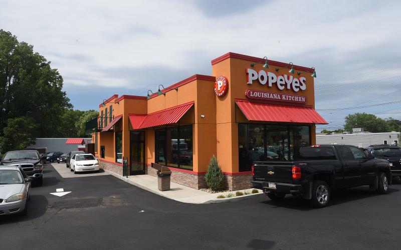 A line of cars forms for the drive-through at a Popeyes in Millcreek, Pa., on the restaurant’s opening day in July 2018. There are plans for a Popeyes to open in Live Oak on U.S. Hwy. 129 N. (JACK HANRAHAN/Erie Times News/TNS)