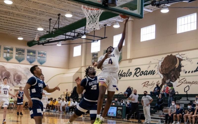 Columbia forward Marcus Peterson scores a layup against Tampa Gaither during the Battle at The Villages on Tuesday. (COURTESY)