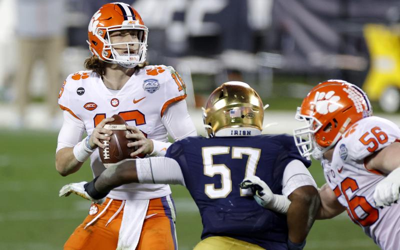Clemson quarterback Trevor Lawrence (16) looks to pass in the fourth quarter against Notre Dame during the ACC Championship game at Bank of America Stadium on Dec 19 in Charlotte, N.C. (JARED C. TILTON/Getty Images/TNS)