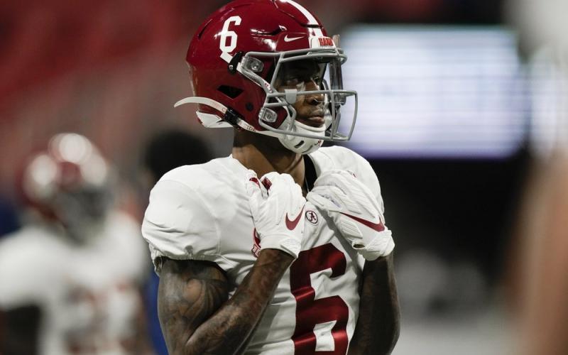 Alabama wide receiver DeVonta Smith (6) warms up before the Southeastern Conference championship game against Florida on Dec. 19 in Atlanta. Heisman Trophy finalists Mac Jones and DeVonta Smith have been selected to The Associated Press All-America team, Monday, Dec. 28, 2020, leading a contingent of five Alabama players on the first-team offense. (BRYNN ANDERSON/Associated Press)