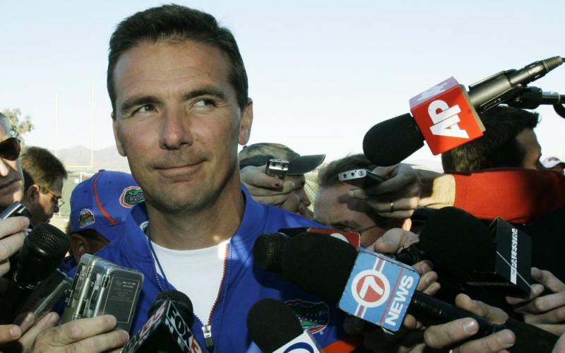 Former Florida head coach Urban Meyer talks to reporters after practice on Jan. 8, 2007, ahead of the BCS Championship game against Ohio State in Scottsdale, Ariz. Meyer agreed to become the new head coach of the Jacksonville Jaguars on Thursday. (AP FILE PHOTO)