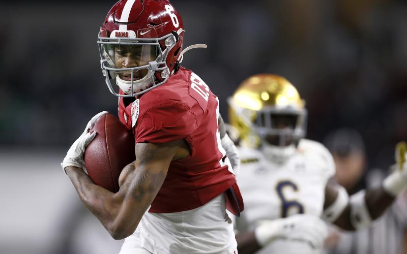 Alabama wide receiver DeVonta Smith (6) scores a touchdown against Notre Dame Fighting Irish during the first quarter of the Rose Bowl on Jan. 1 Arlington, Texas. (TOM PENNINGTON/Getty Images/TNS)