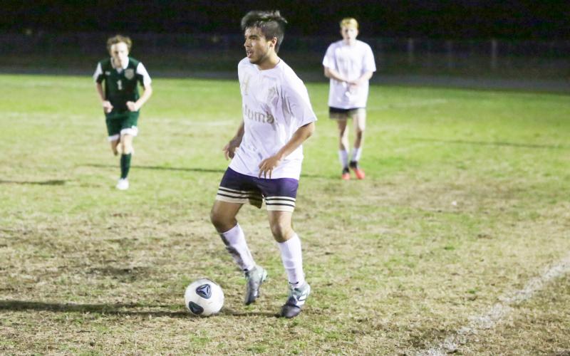 Columbia’s Marcos Medina-Rodriguez looks to pass during the District 2-6A championship against Lincoln on Feb. 8. (BRENT KUYKENDALL/Lake City Reporter)