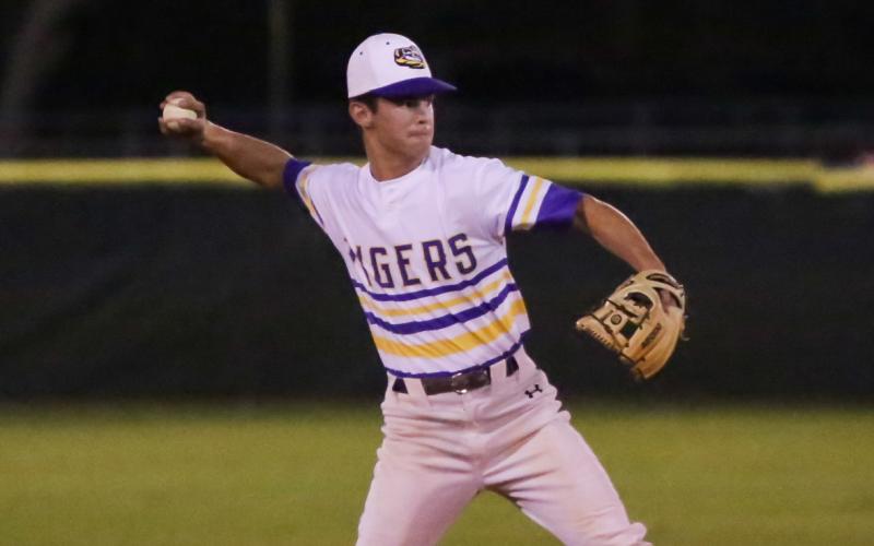 Columbia shortstop Mason Gray fires to first base against Ocala Forest last season. (FILE)