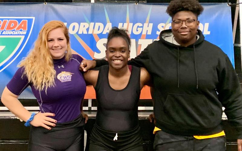 Columbia lifters Reece Chasteen (from left), Da'Niya Lewis and Trachelle Williams at the Class 2A state meet on Saturday at Suwannee. (COURTESY)