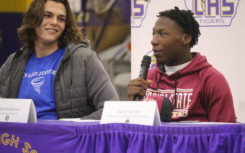 Columbia defensive back/linebacker Shyheim Brown (right) speaks during Wednesday’s signing ceremony. Brown signed with Florida State in December. (JORDAN KROEGER/Lake City Reporter)