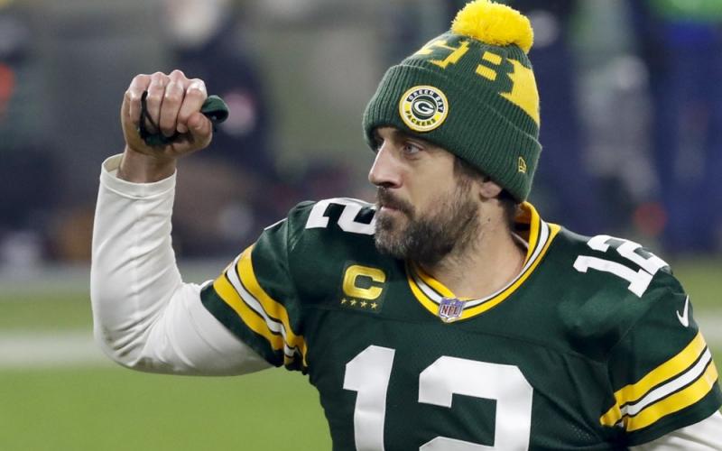 Green Bay Packers quarterback Aaron Rodgers pumps his fist after an NFL divisional playoff game against the Los Angeles Rams on Jan. 16 in Green Bay, Wis. (MIKE ROEMER/Associated Press)