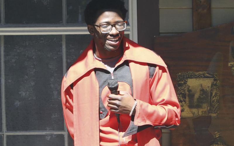 Columbia High School senior Daniel Fulton donned a relevant outfit for his tribute to James Brown while singing 'It's a Man's, Man's, Man's World.' (MORGAN MCMULLEN/Lake City Reporter)