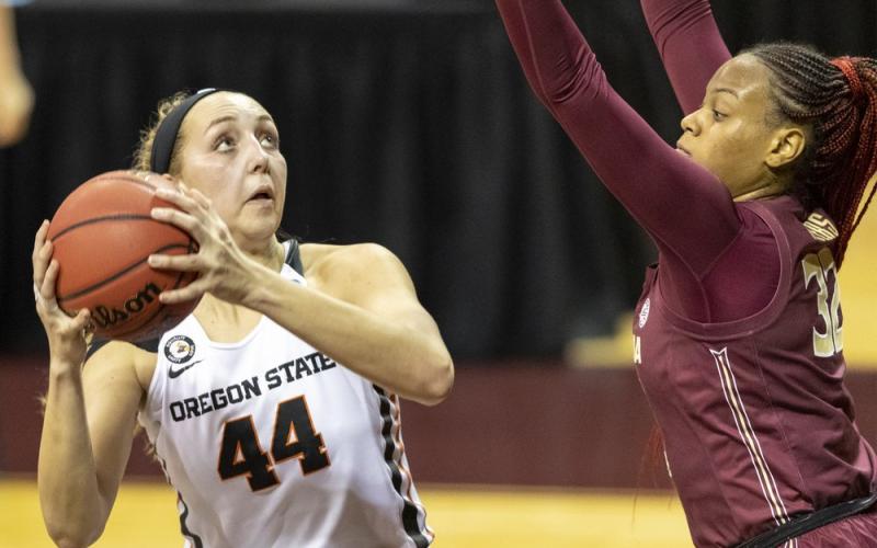 Oregon State's Taylor Jones (44) looks toward the basket over Florida State forward Valencia Myers (32) during the first round of the women's NCAA Tournament at the University Events Center on Sunday in San Marcos, Texas. (STEPHEN SPILLMAN/Associated Press)