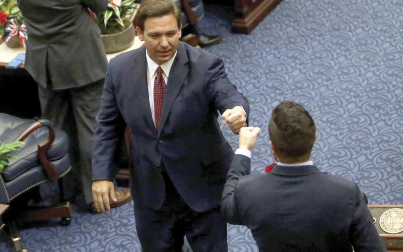 Gov. Ron DeSantis exits after delivering the State of the State address during the joint session of the Florida Legislature at the Capitol in Tallahassee on Tuesday. (IVY CEBALLO/Tampa Bay Times/TNS)
