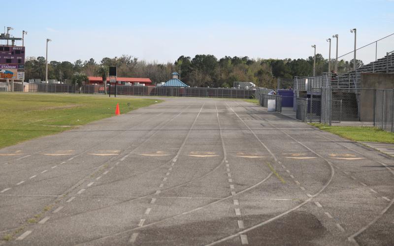 Columbia High School's track is overdue for an upgrade, one coach Lawrence Davis hopes to make happen at a meeting on March 11. (JORDAN KROEGER/Lake City Reporter)
