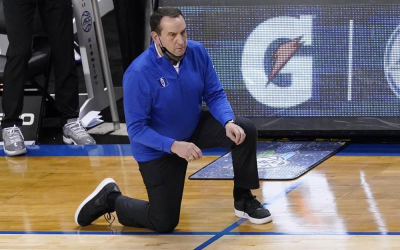Duke head coach Mike Krzyzewski watches the action during the second half of a game against Louisville in the second round of the Atlantic Coast Conference tournament on Wednesday in Greensboro, N.C. (GERRY BROOME/Associated Press)