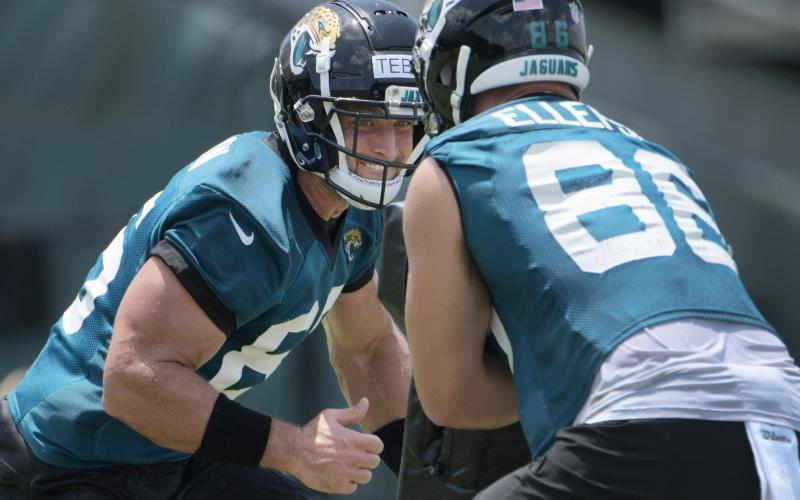 Jacksonville Jaguars tight end Tim Tebow (85) prepares to make contact with Ben Ellefson (86) during drills at Thursday's OTA session. (BOB SELF/Florida Times-Union/TNS)