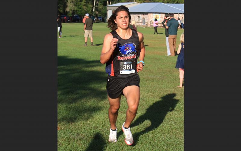Branford runner Justin Hernandez won the boys race at the Suwannee Invitational on Saturday. (PAUL BUCHANAN/Special to the Reporter)