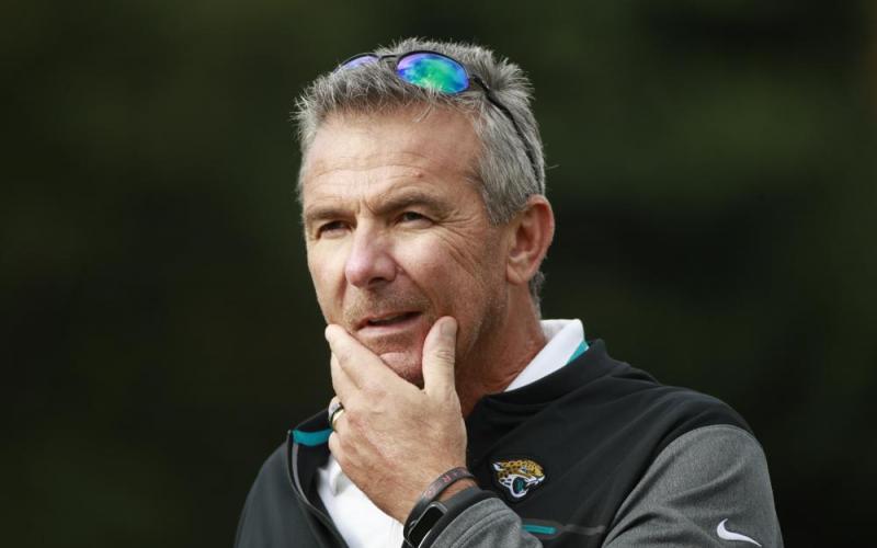 Jacksonville Jaguars head coach Urban Meyer listens to a question during media availability on Friday at Chandlers Cross, England. (IAN WALTON/Associated Press)