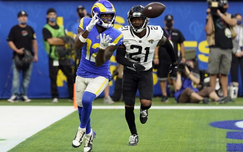 Los Angeles Rams wide receiver Van Jefferson catches a touchdown in front of Jacksonville Jaguars cornerback Nevin Lawson during Sunday’s game in Inglewood, Calif. (JAE C. HONG/Associated Press)